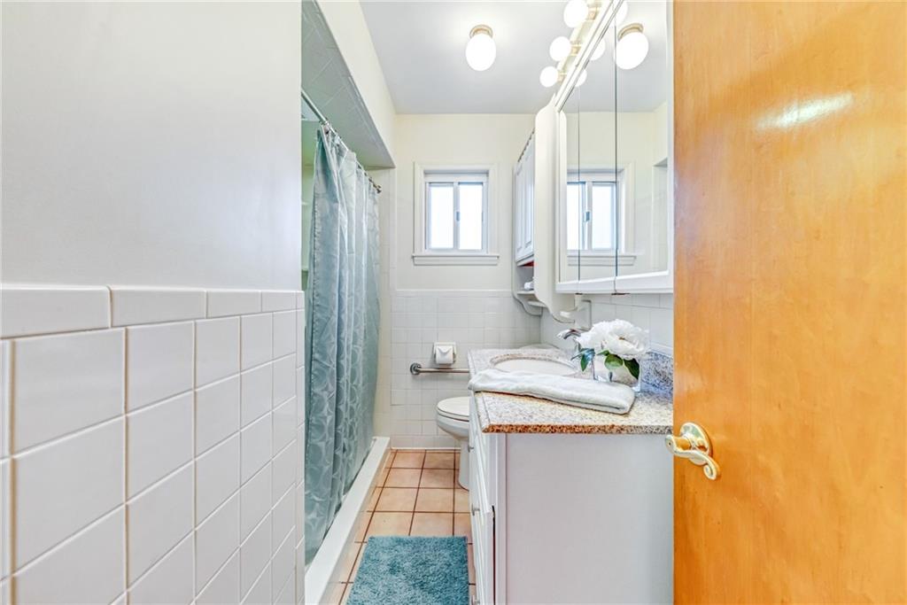 101 Lorish Road, Unit A McKees Rocks, PA 15136 - Photo 12 of 25 a bathroom with a sink and a mirror