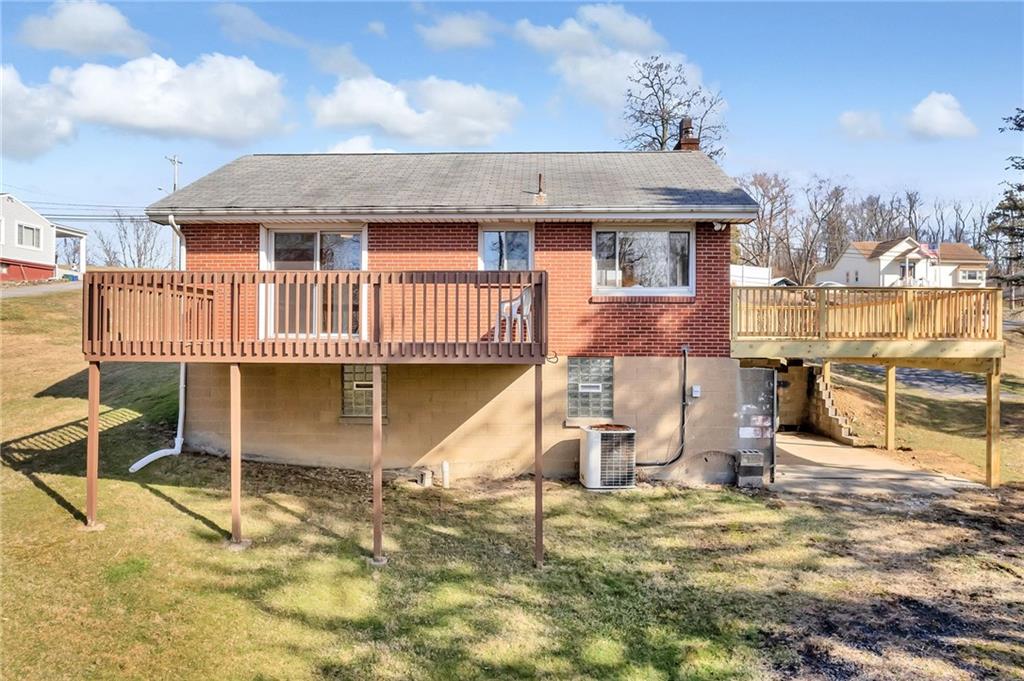 101 Lorish Road, Unit A McKees Rocks, PA 15136 - Photo 22 of 25 front view of a house with a yard