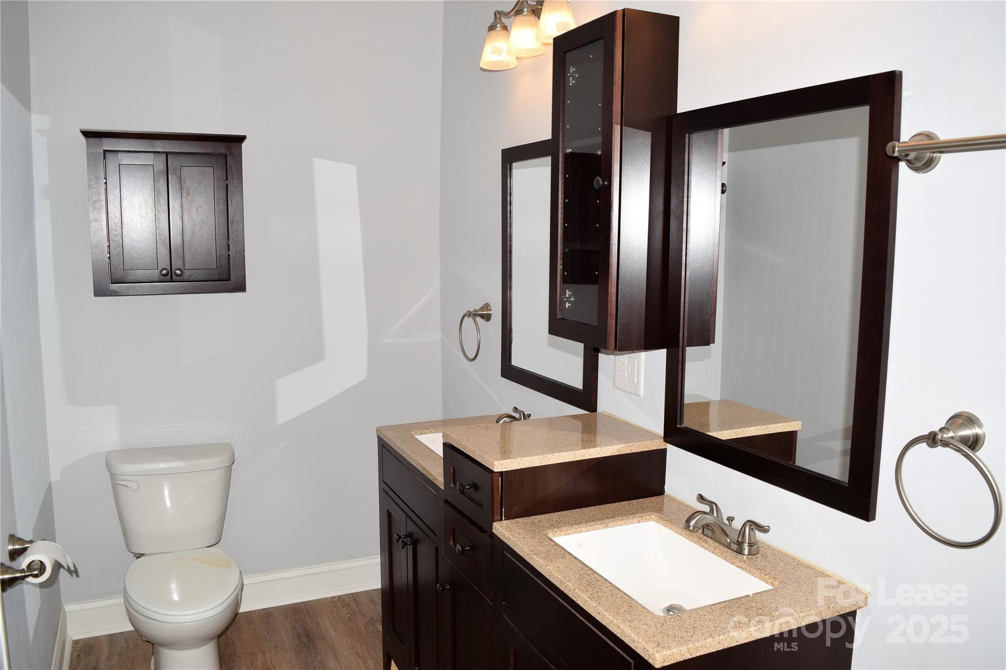 234 North Eastway Drive Troutman, NC 28166 - Photo 18 of 37 a bathroom with a sink toilet and mirror