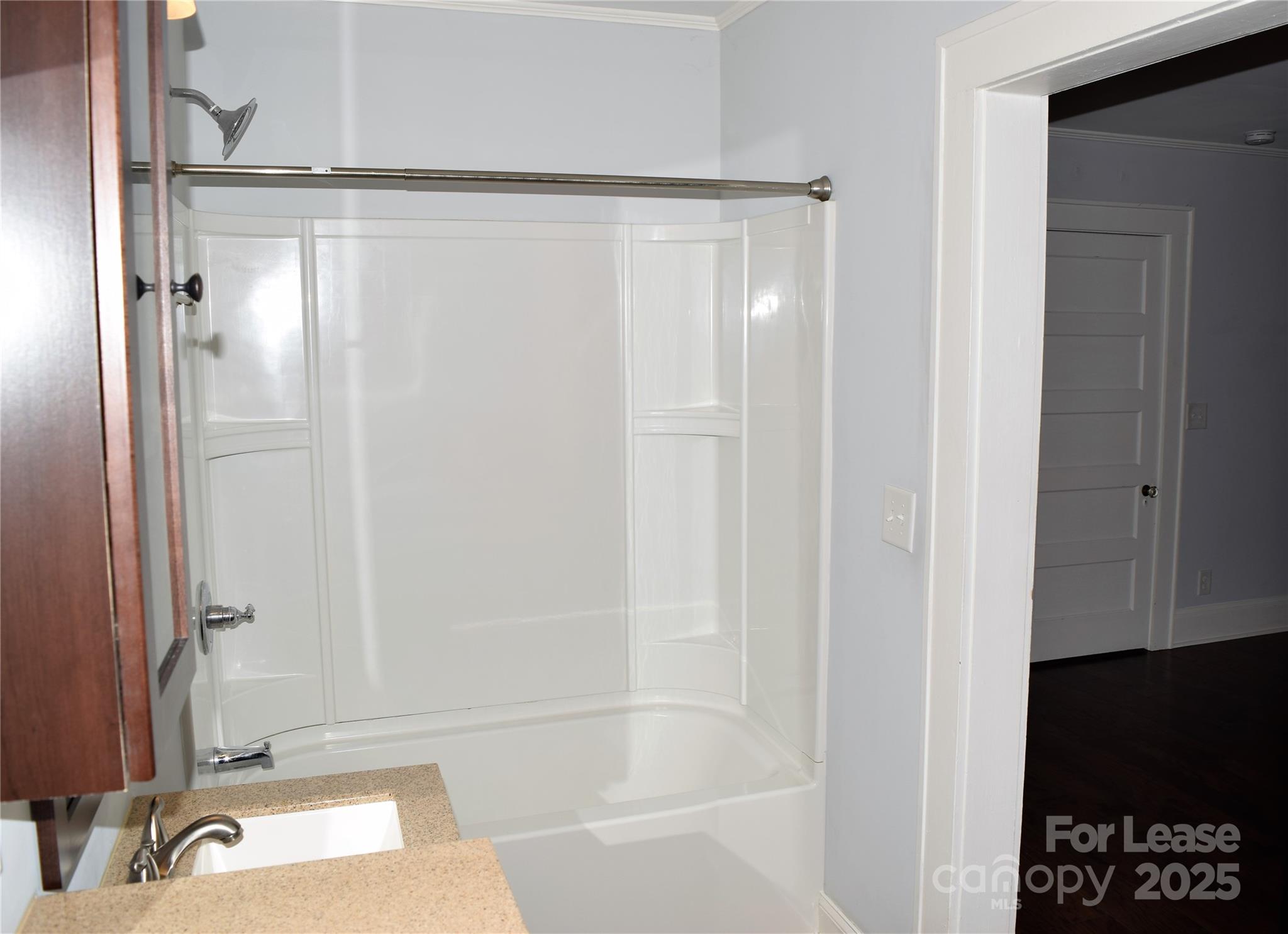 234 North Eastway Drive Troutman, NC 28166 - Photo 19 of 37 a bathroom with a bathtub and a shower