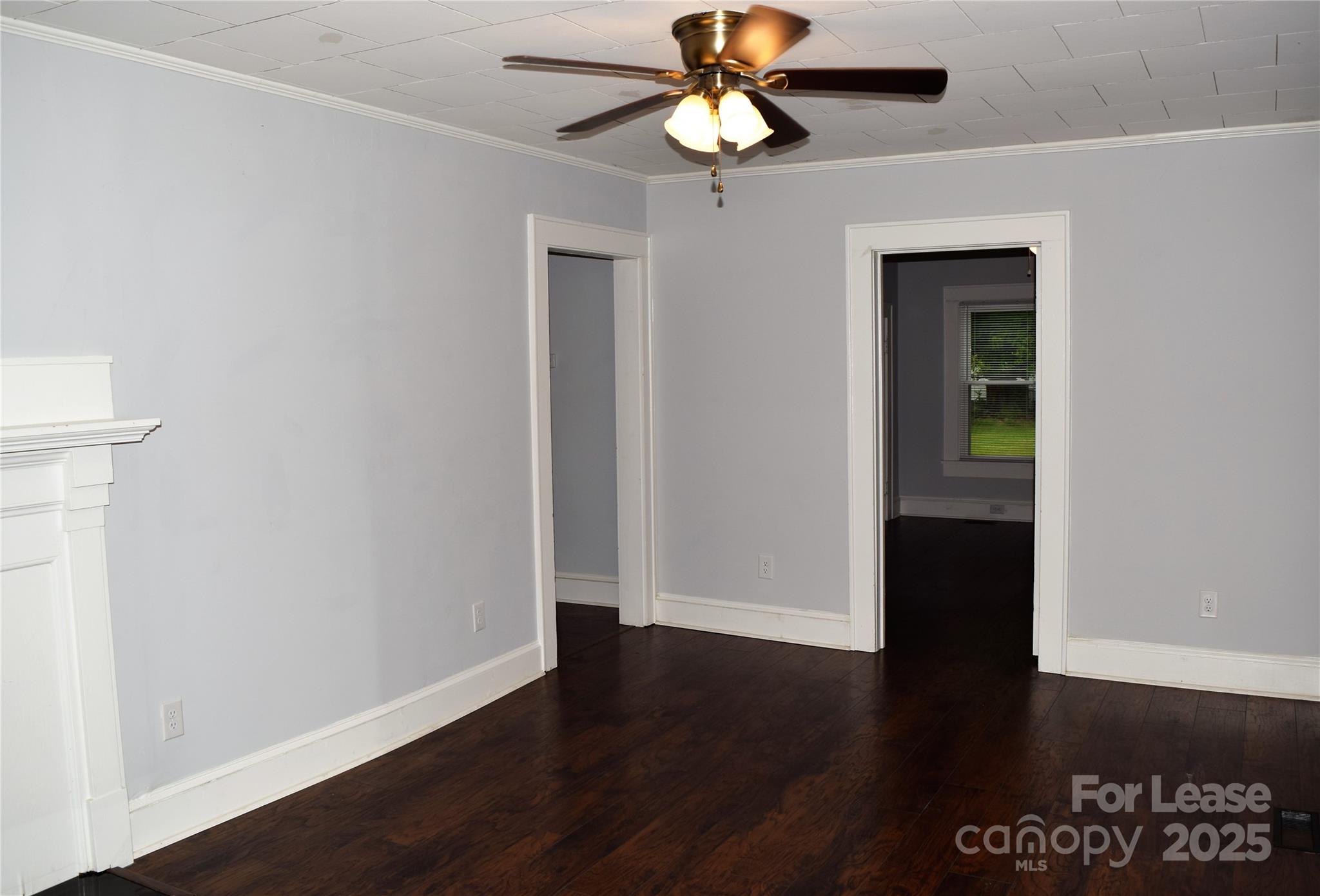 234 North Eastway Drive Troutman, NC 28166 - Photo 8 of 37 a view of an empty room with wooden floor