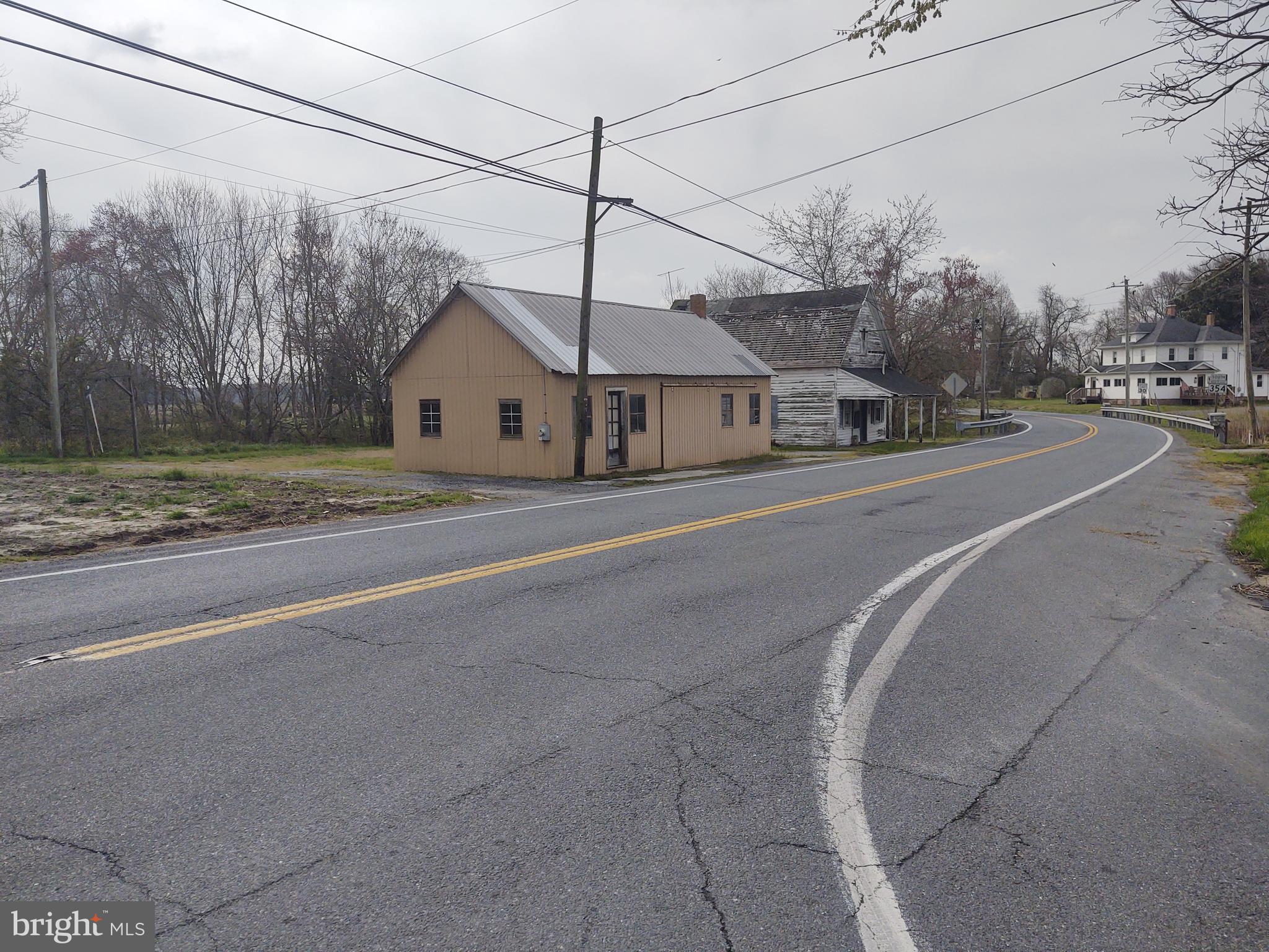 5045 Powellville Road Pittsville, MD 21850 - Photo 6 of 14 a view of a town with barn house
