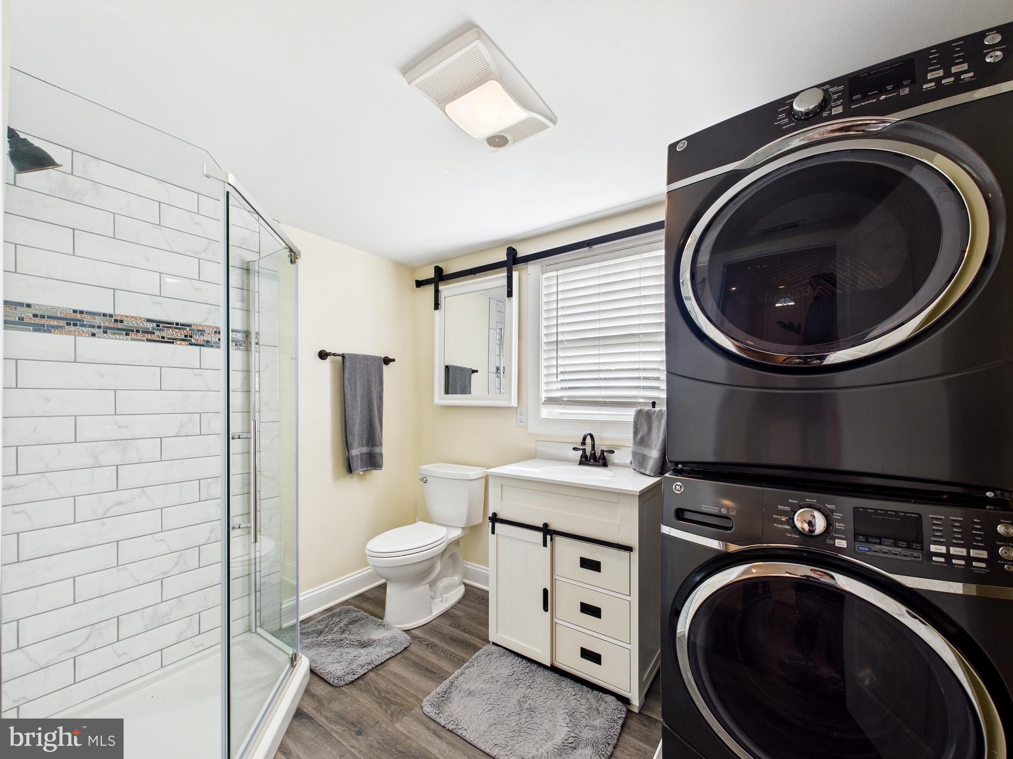 15551 Wharton Road Goldsboro, MD 21636 - Photo 16 of 80 a view of a storage & utility room with a washer dryer