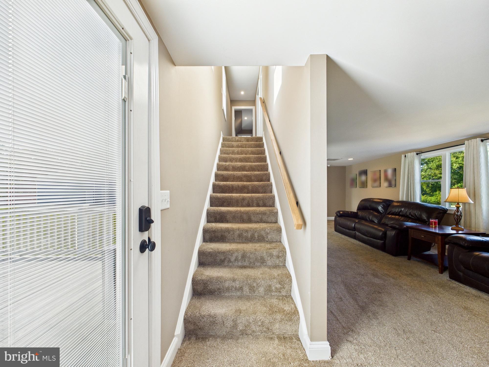 15551 Wharton Road Goldsboro, MD 21636 - Photo 25 of 80 Inviting staircase leads to cozy upper retreat.