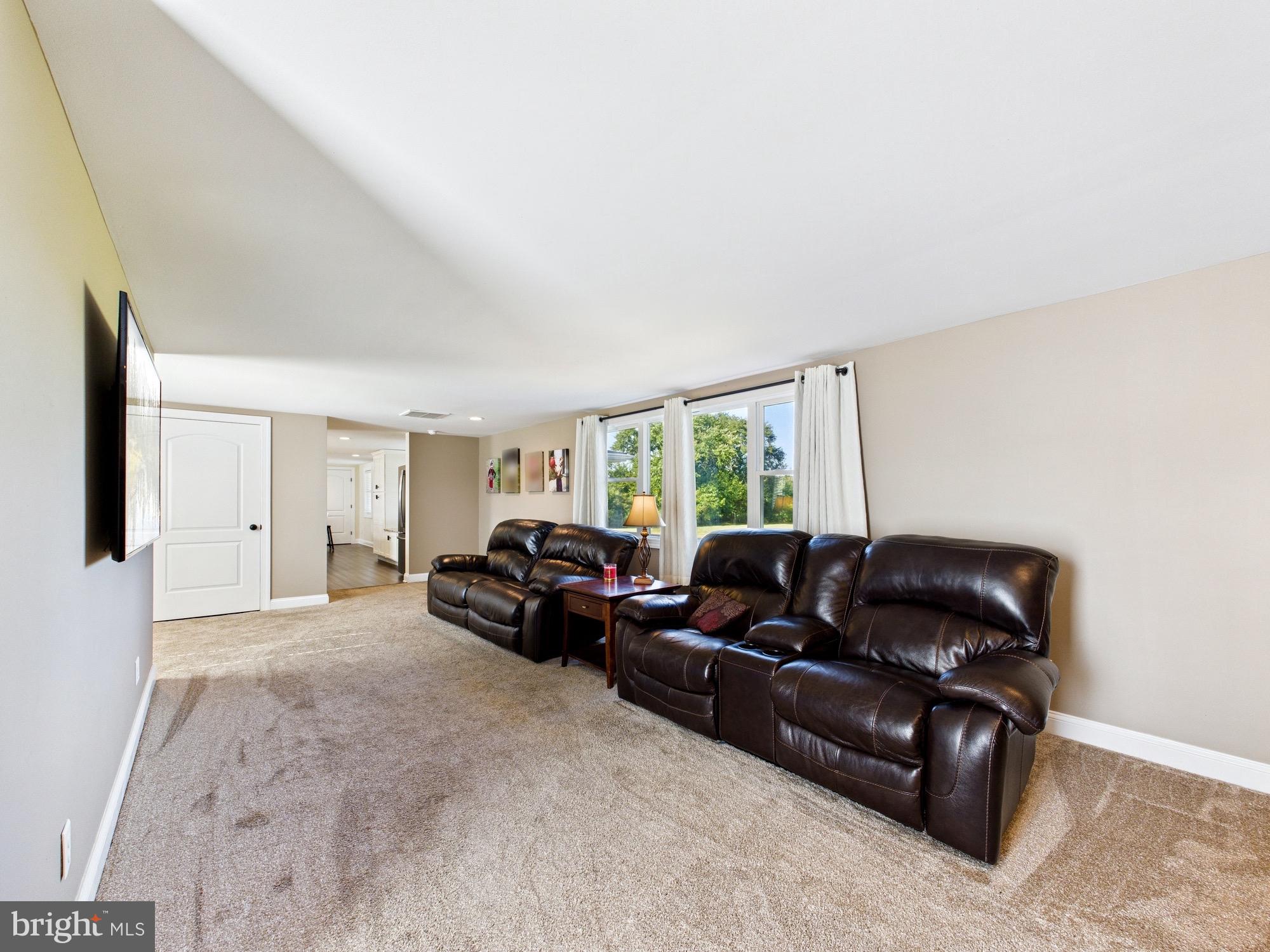 15551 Wharton Road Goldsboro, MD 21636 - Photo 26 of 80 a living room with furniture and a large window