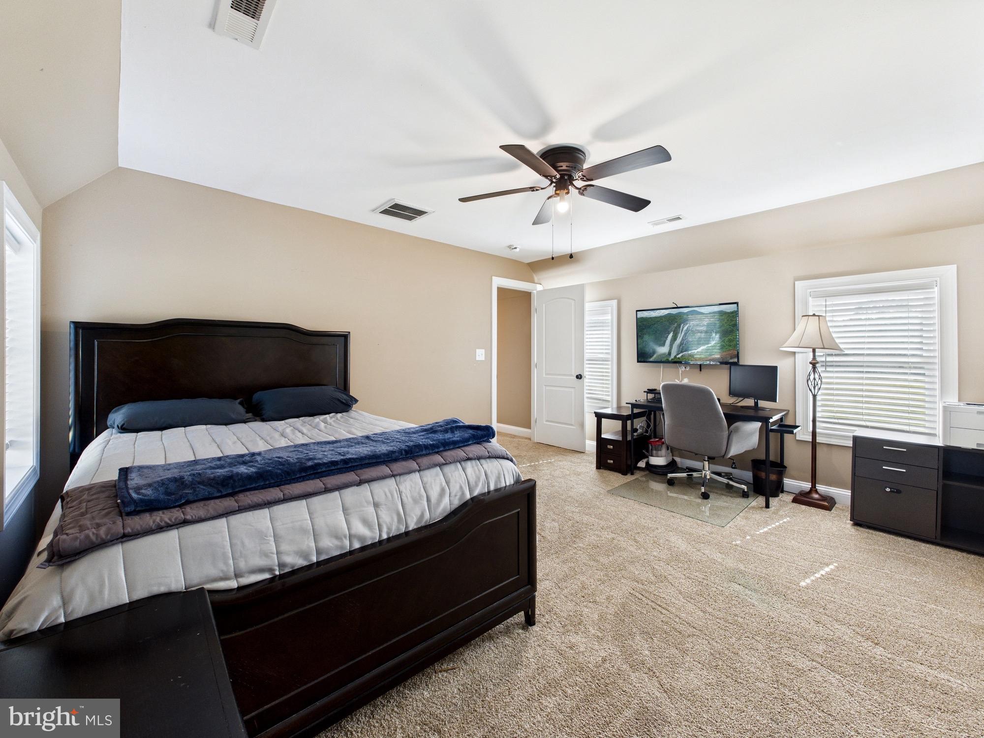 15551 Wharton Road Goldsboro, MD 21636 - Photo 40 of 80 Spacious bedroom with modern workspace.
