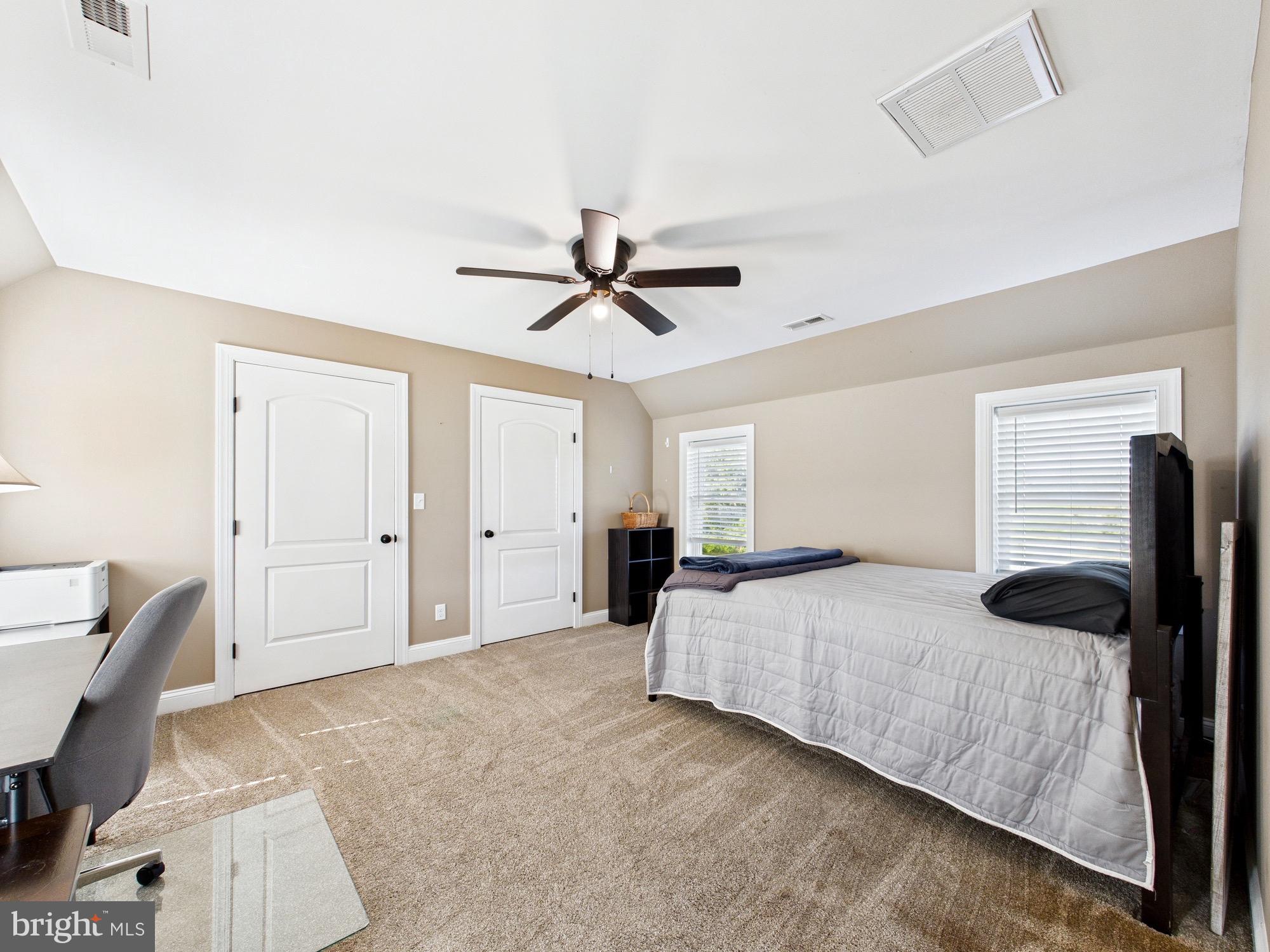 15551 Wharton Road Goldsboro, MD 21636 - Photo 44 of 80 a bedroom with a bed and a couch