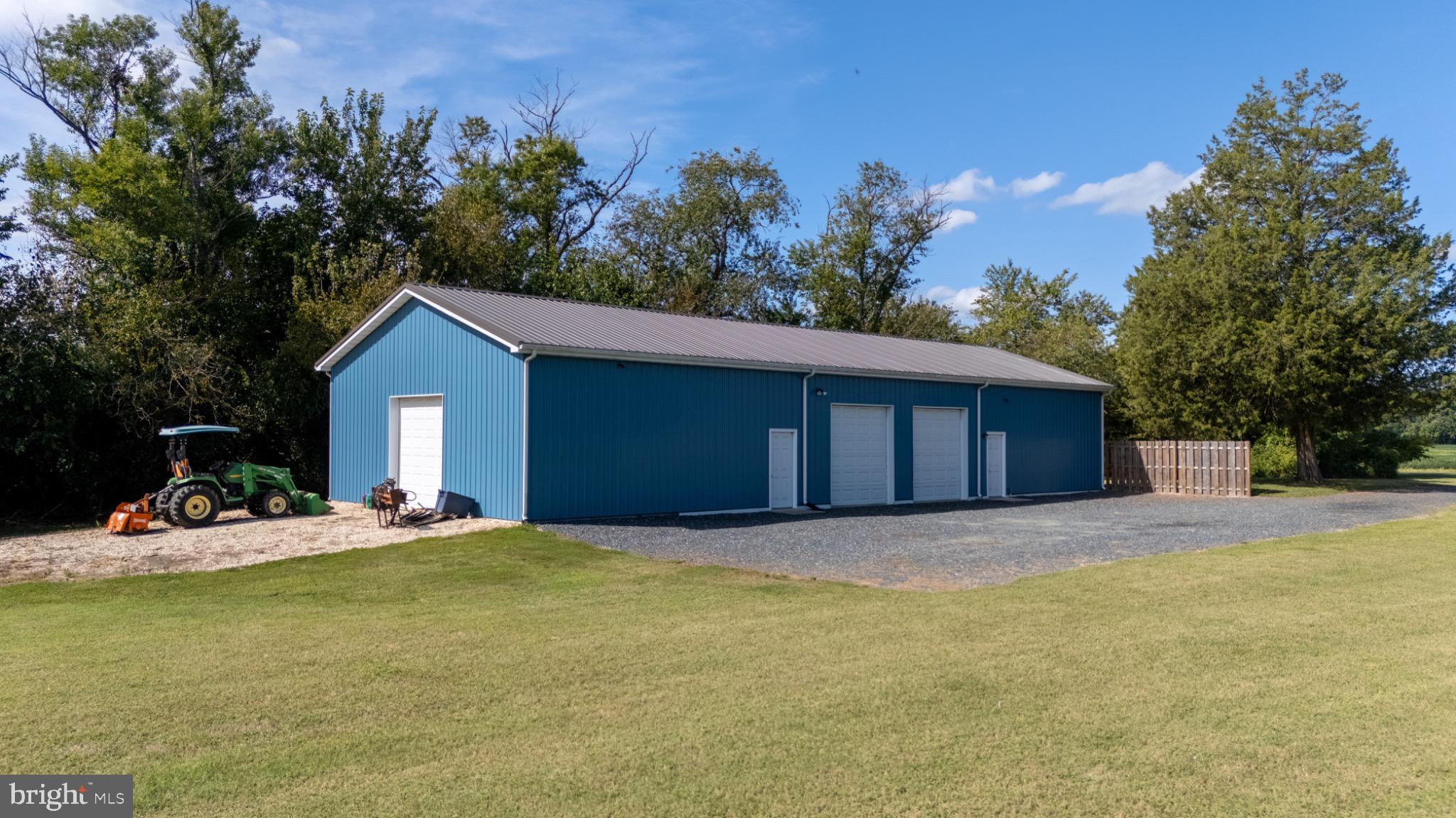 15551 Wharton Road Goldsboro, MD 21636 - Photo 48 of 80 a front view of a house with a yard