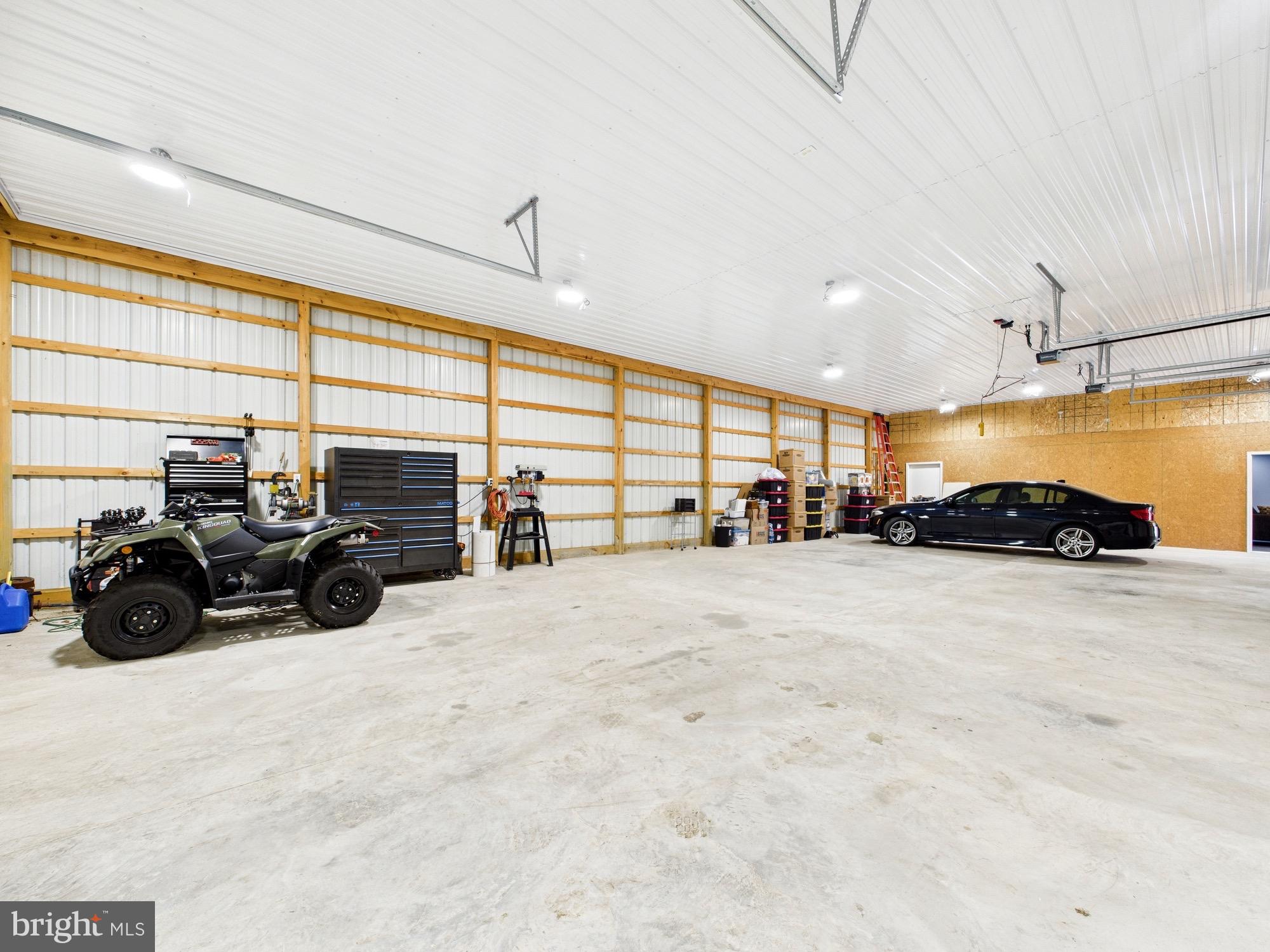15551 Wharton Road Goldsboro, MD 21636 - Photo 49 of 80 a view of parking garage with cars