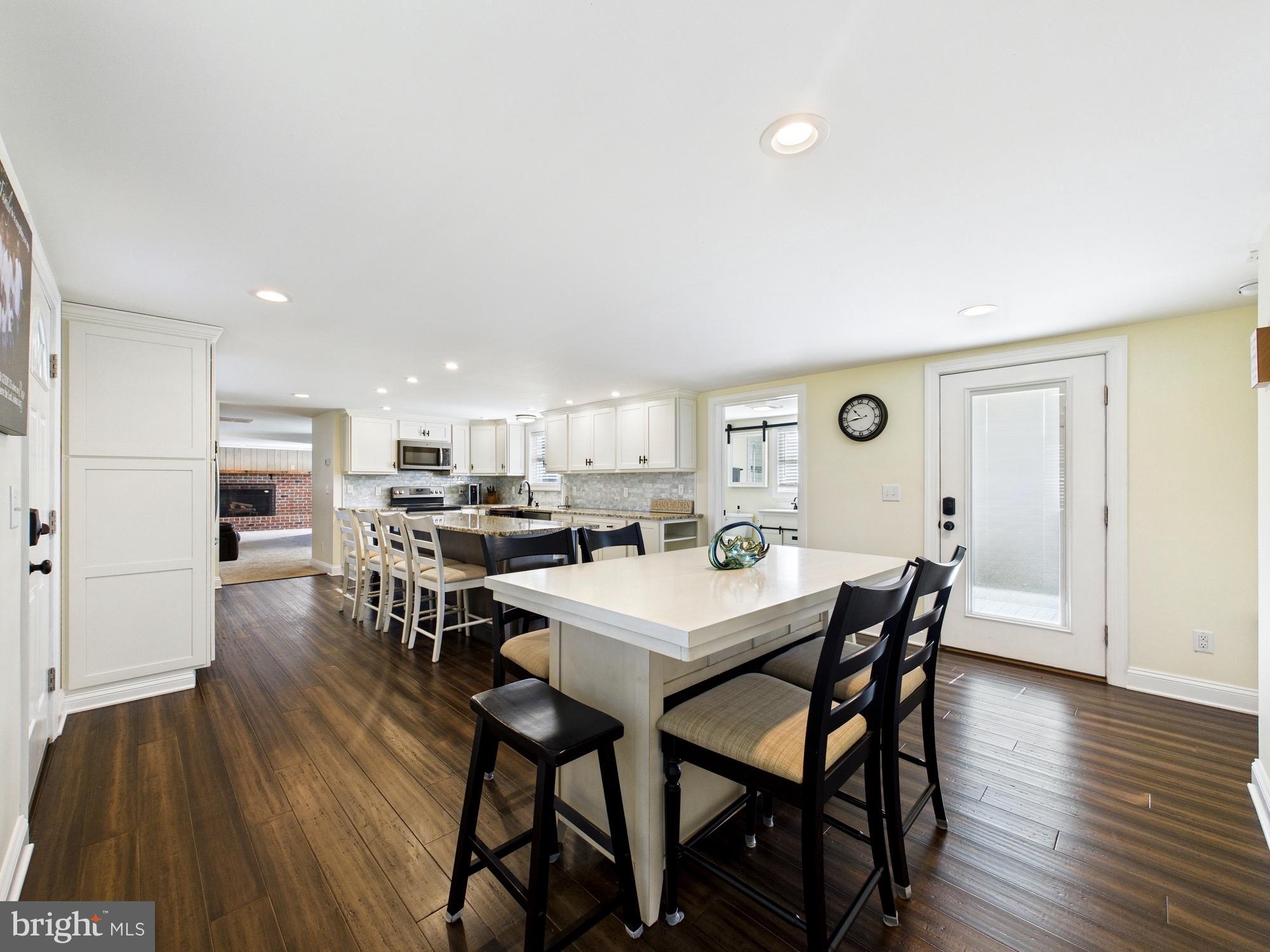 15551 Wharton Road Goldsboro, MD 21636 - Photo 6 of 80 a view of a dining room with furniture and wooden floor