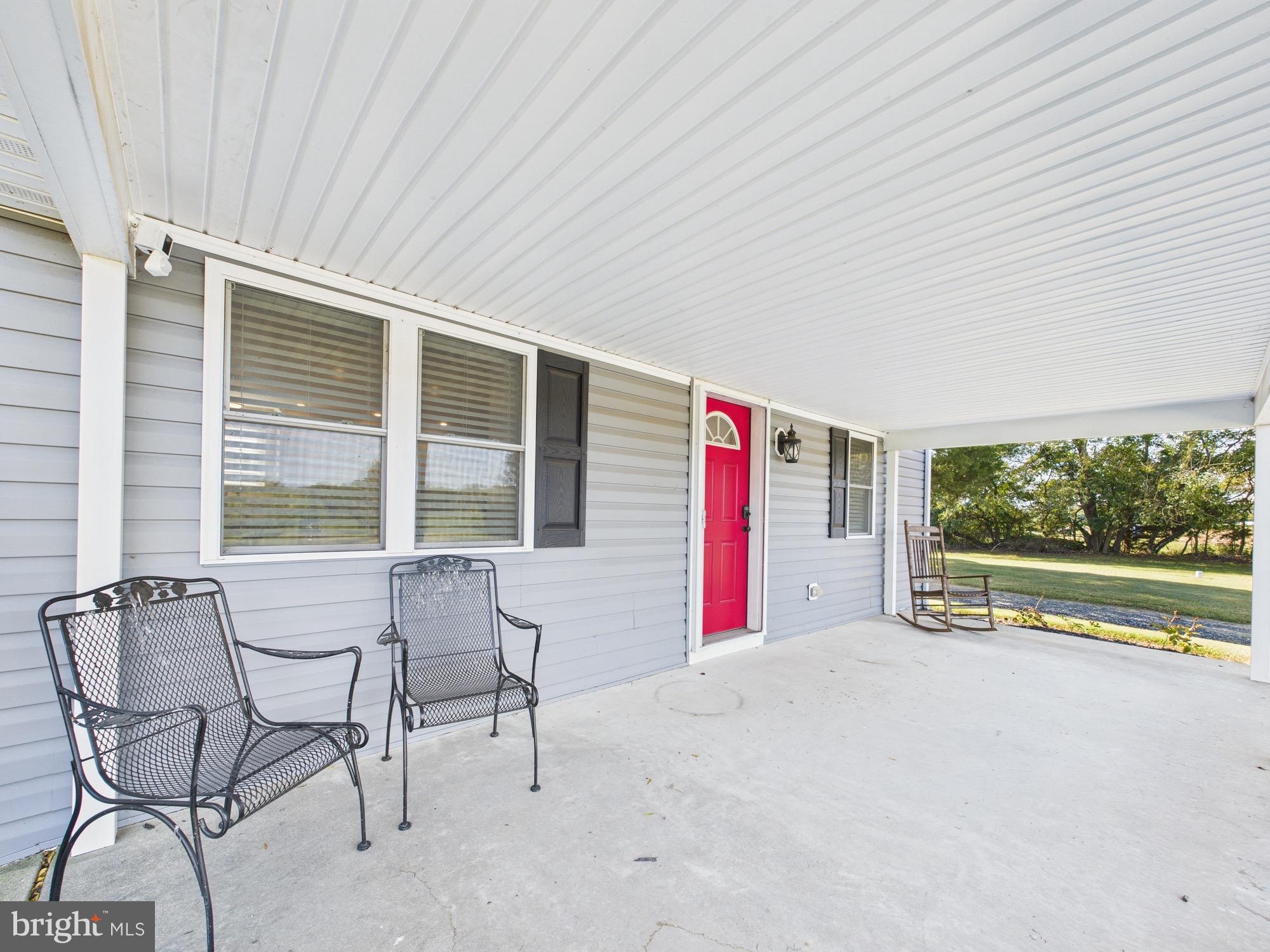 15551 Wharton Road Goldsboro, MD 21636 - Photo 61 of 80 a view of an empty room with a window and table chair