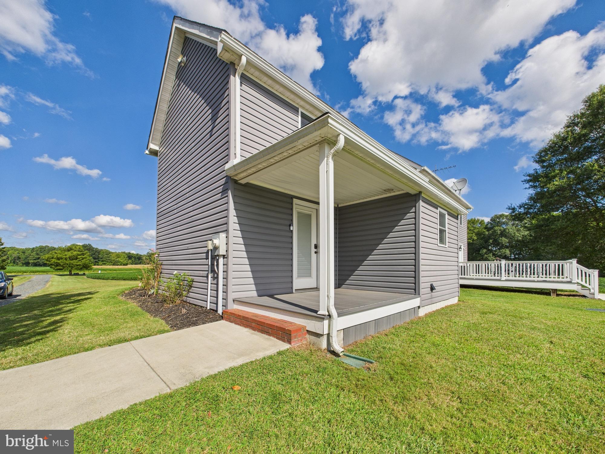 15551 Wharton Road Goldsboro, MD 21636 - Photo 64 of 80 a view of a house with backyard and a garden