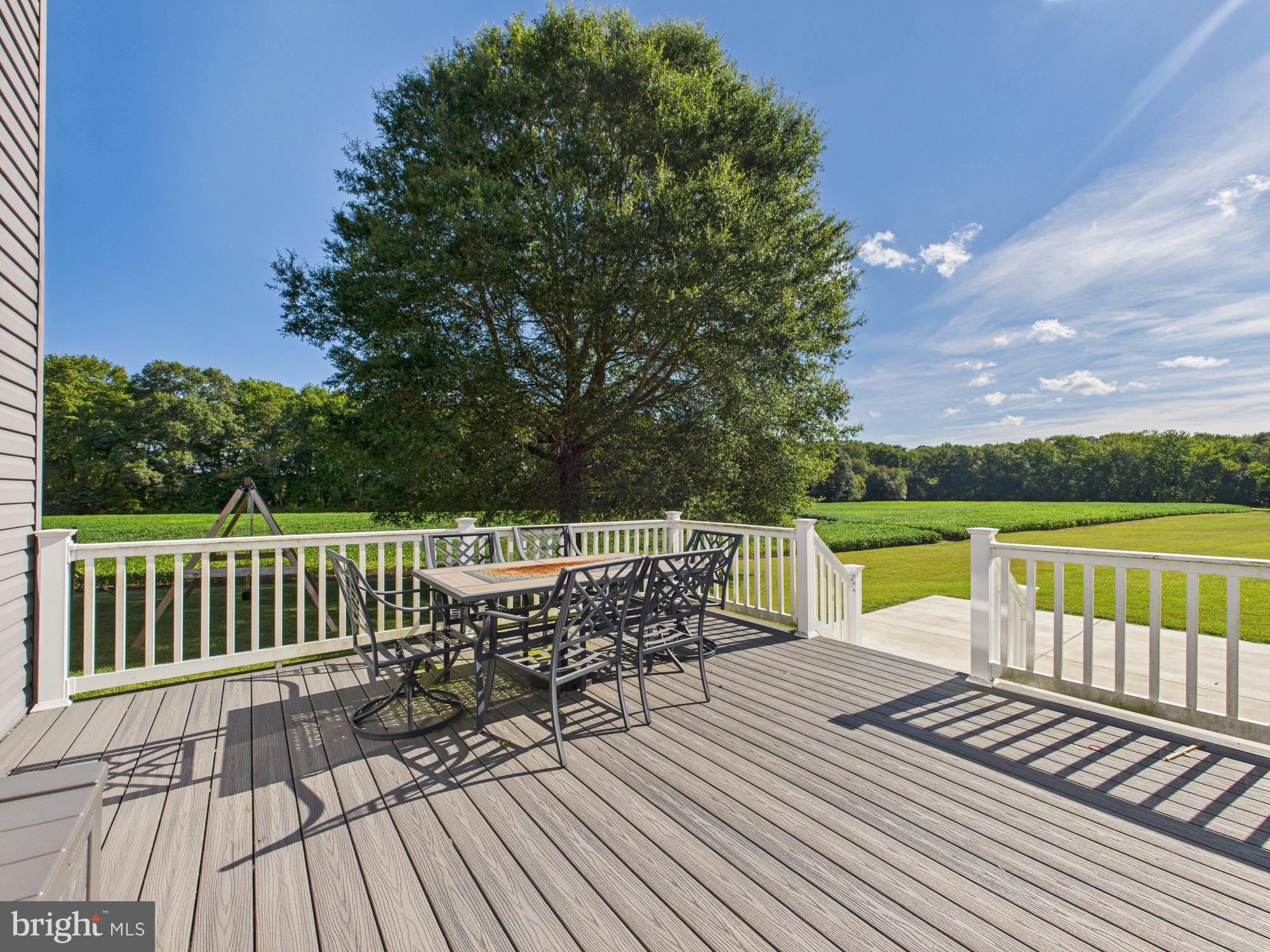 15551 Wharton Road Goldsboro, MD 21636 - Photo 67 of 80 a view of a lake with a table and a chairs