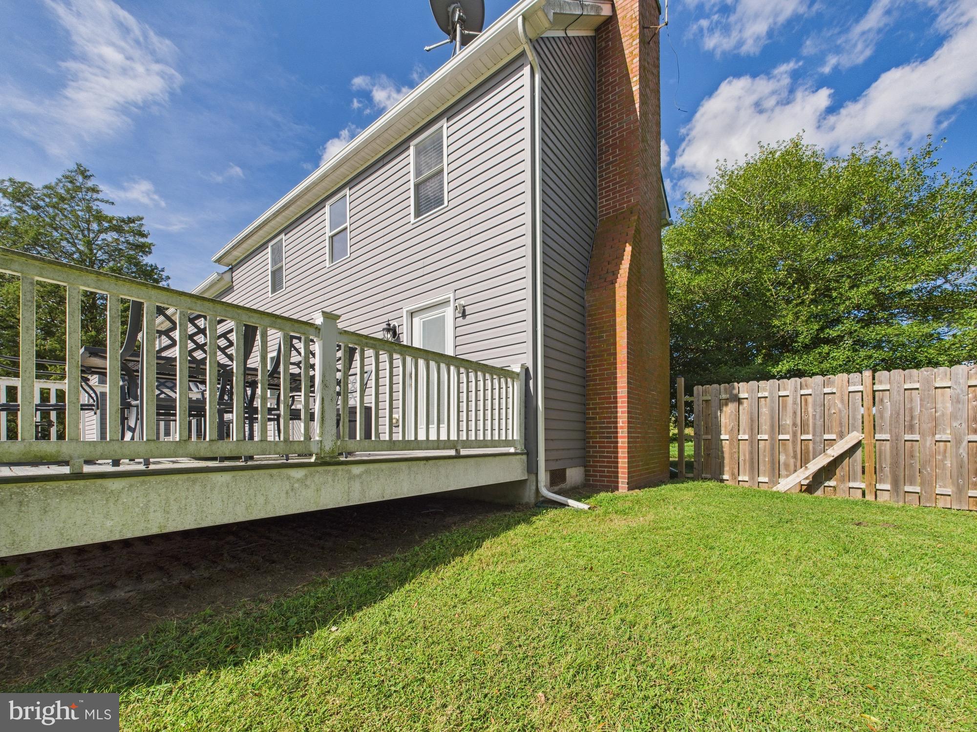 15551 Wharton Road Goldsboro, MD 21636 - Photo 69 of 80 a view of a house with a wooden deck