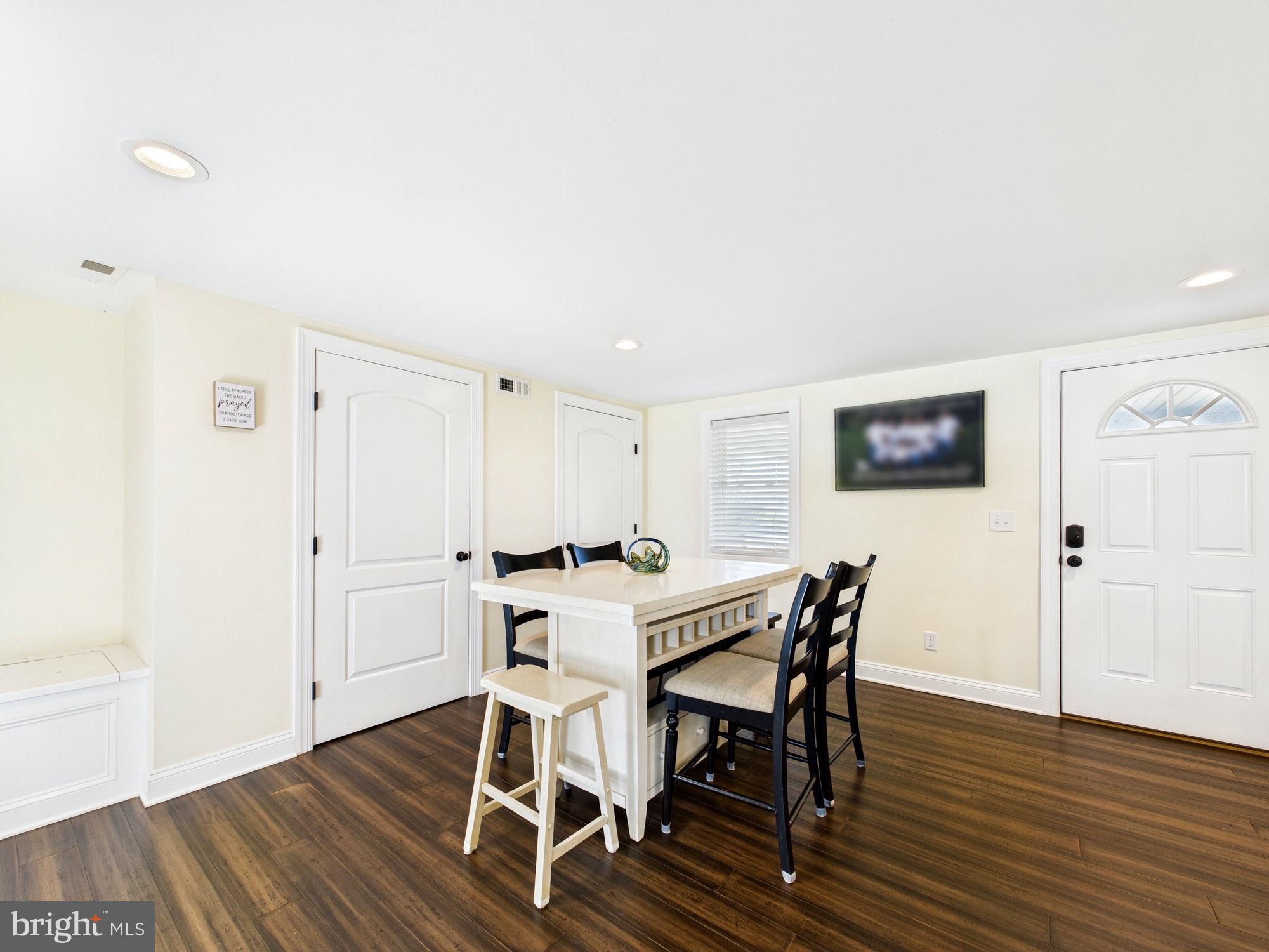 15551 Wharton Road Goldsboro, MD 21636 - Photo 8 of 80 a view of a dining room with furniture and wooden floor