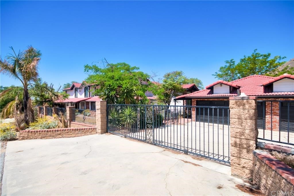 20510 Hill Top Drive Riverside, CA 92507 - Photo 1 of 1 a front view of a house with a outdoor space