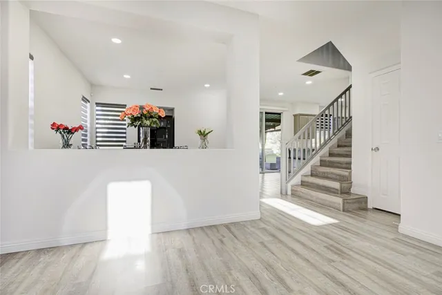 a workspace with furniture window and wooden floor