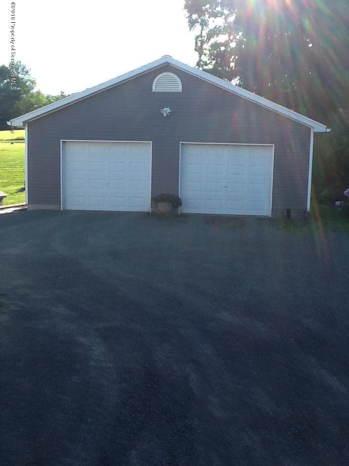 154 Transue Road Laceyville, PA 18623 - Photo 23 of 28 a front view of house with garage