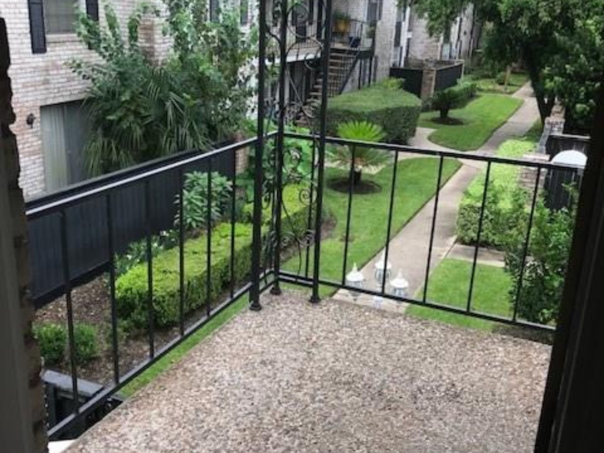 7900 Westheimer Road, Unit 112 Houston, TX 77063 - Photo 2 of 11 A peaceful retreat to enjoy coffee or unwind, overlooking the manicured greenbelt.