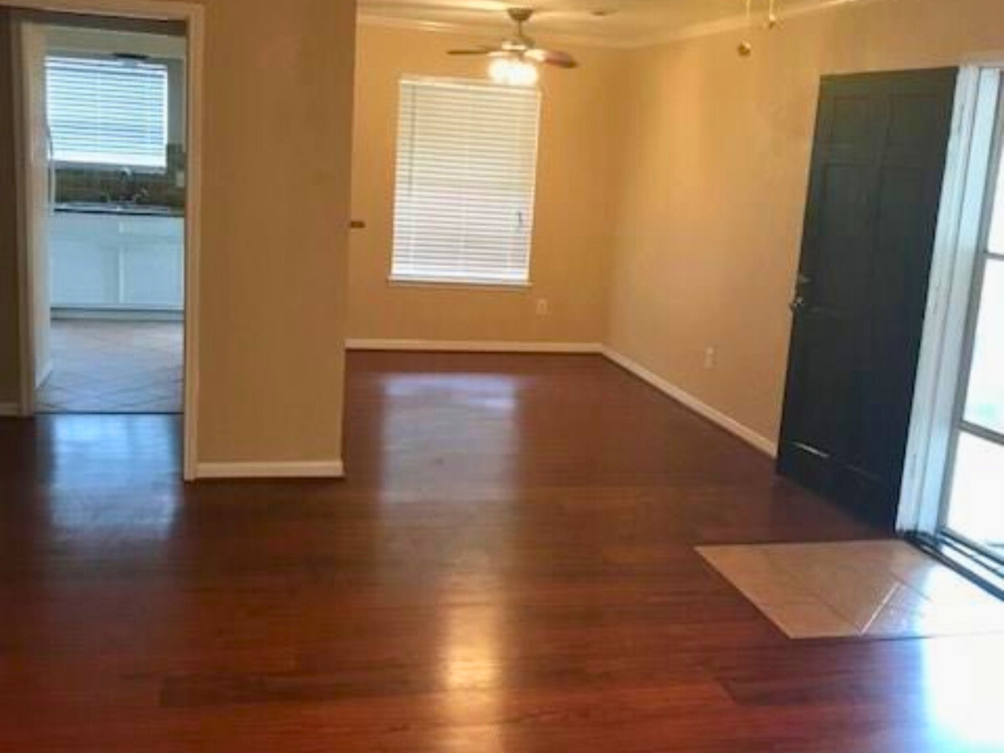 7900 Westheimer Road, Unit 112 Houston, TX 77063 - Photo 3 of 11 Spacious and inviting with warm wood floors, natural light, and a neutral palette that fits any design style.