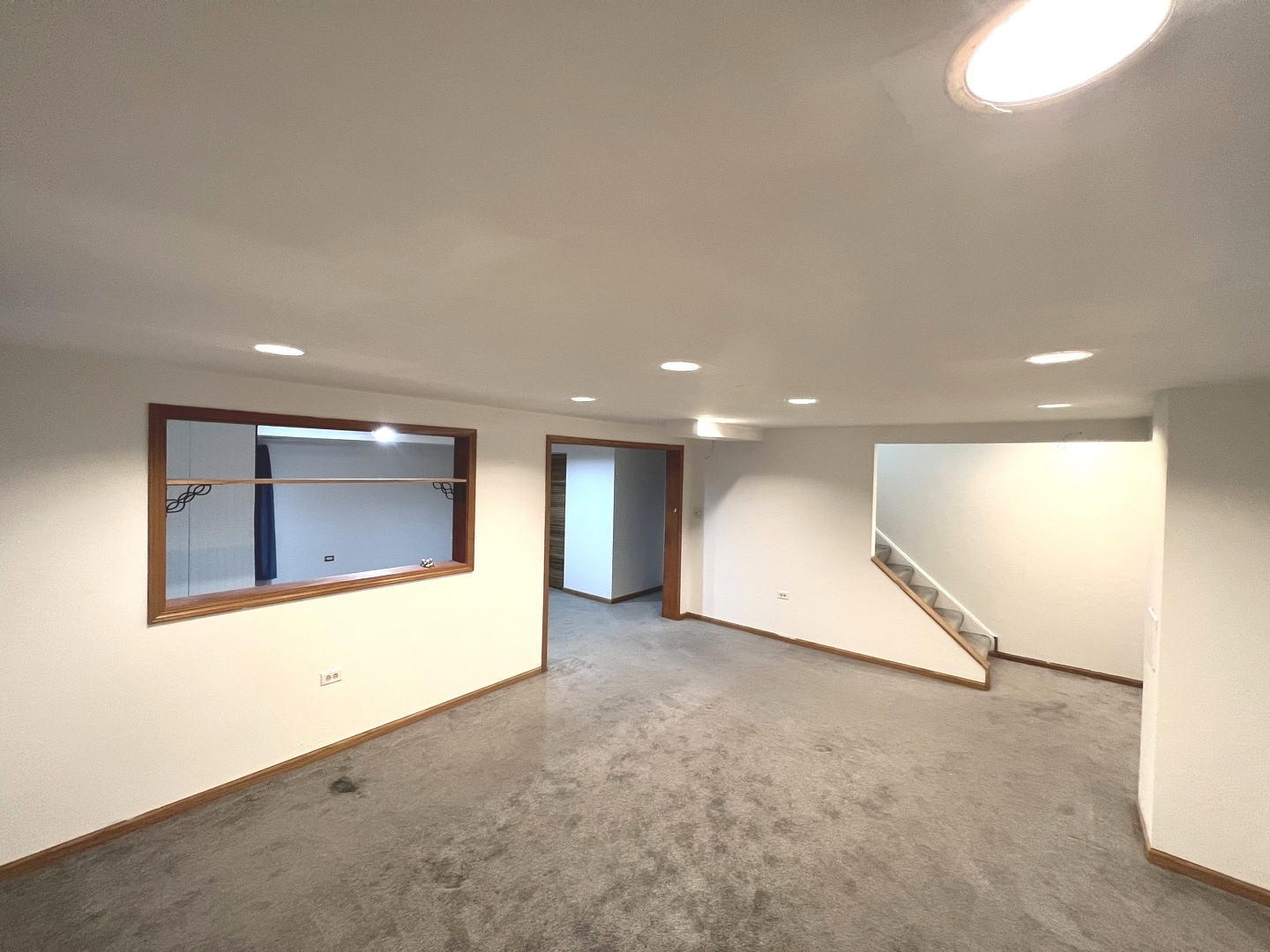 1301 Brookfield Drive Plainfield, IL 60586 - Photo 19 of 25 an empty room with a window and a hallway