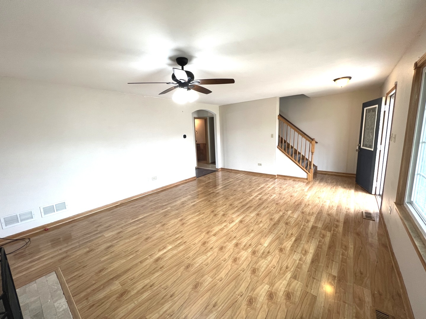 1301 Brookfield Drive Plainfield, IL 60586 - Photo 4 of 25 a view of an empty room and wooden floor