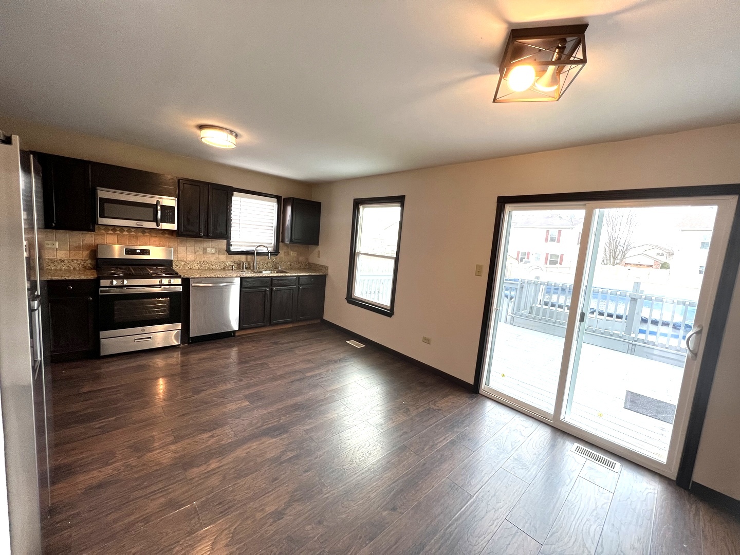 1301 Brookfield Drive Plainfield, IL 60586 - Photo 5 of 25 a view of kitchen with sink and wooden floor