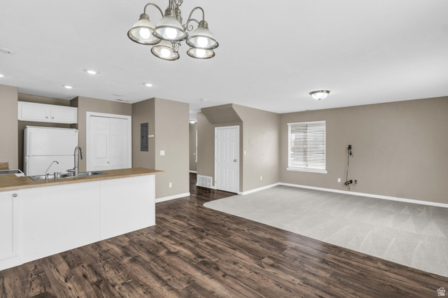 656 South 910 West, Unit 25 Pleasant Grove, UT 84062 - Photo 7 of 25 The kitchen flows seamlessly into the dining and family spaces, making it ideal for everyday living and entertaining.