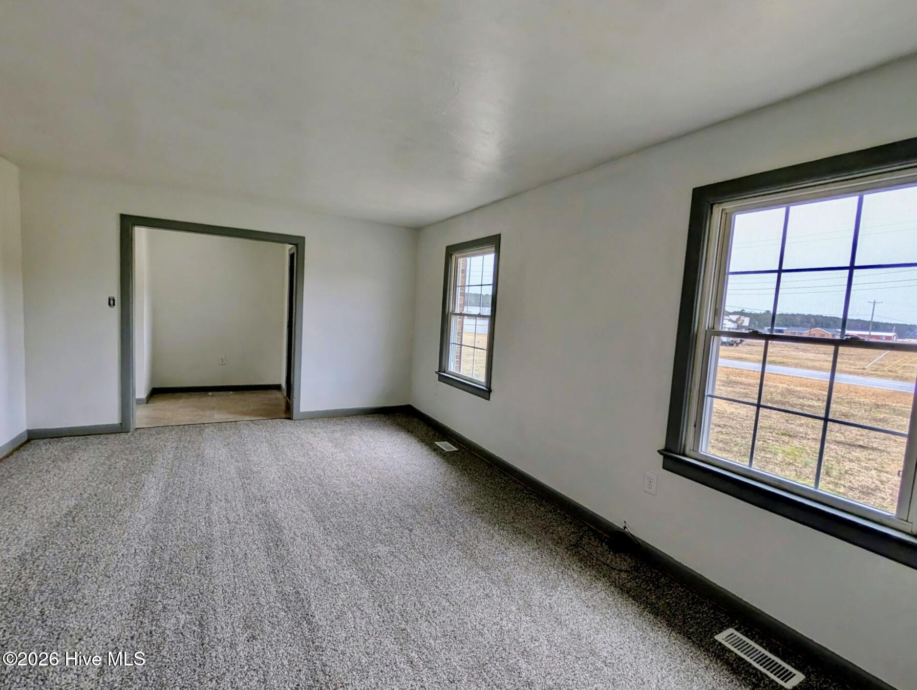 5 Keys Cross Road Hobbsville, NC 27946 - Photo 6 of 42 Livingroom with new carpet and paint