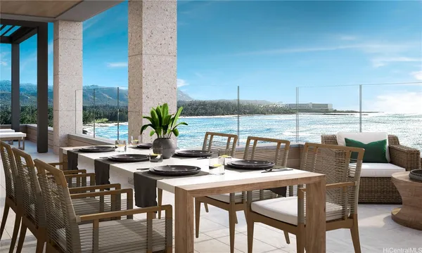 a view of an outdoor dining space with furniture