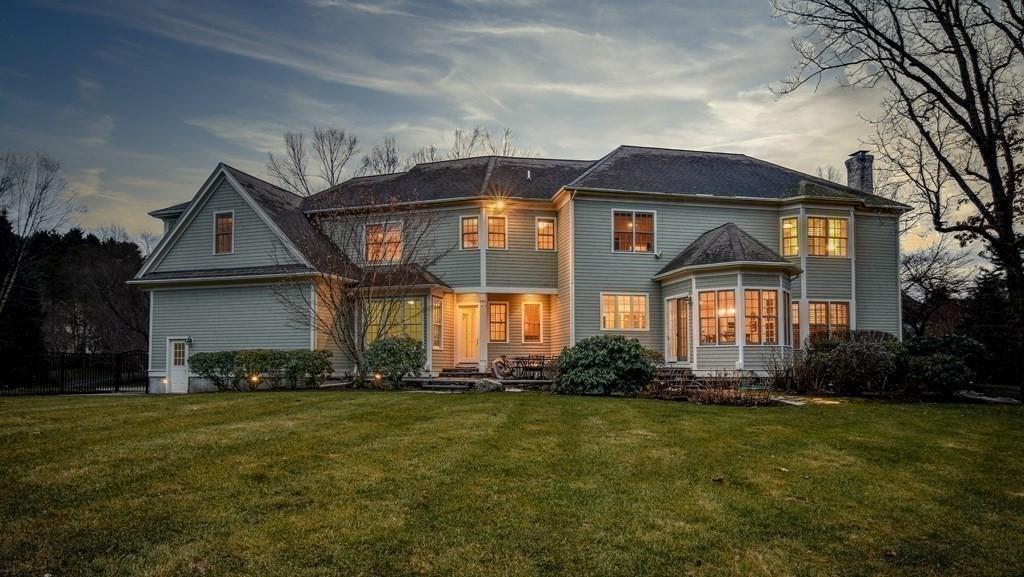 8 Stonegate Lane Dover, MA 02030 - Photo 39 of 42 a front view of house with yard and outdoor seating