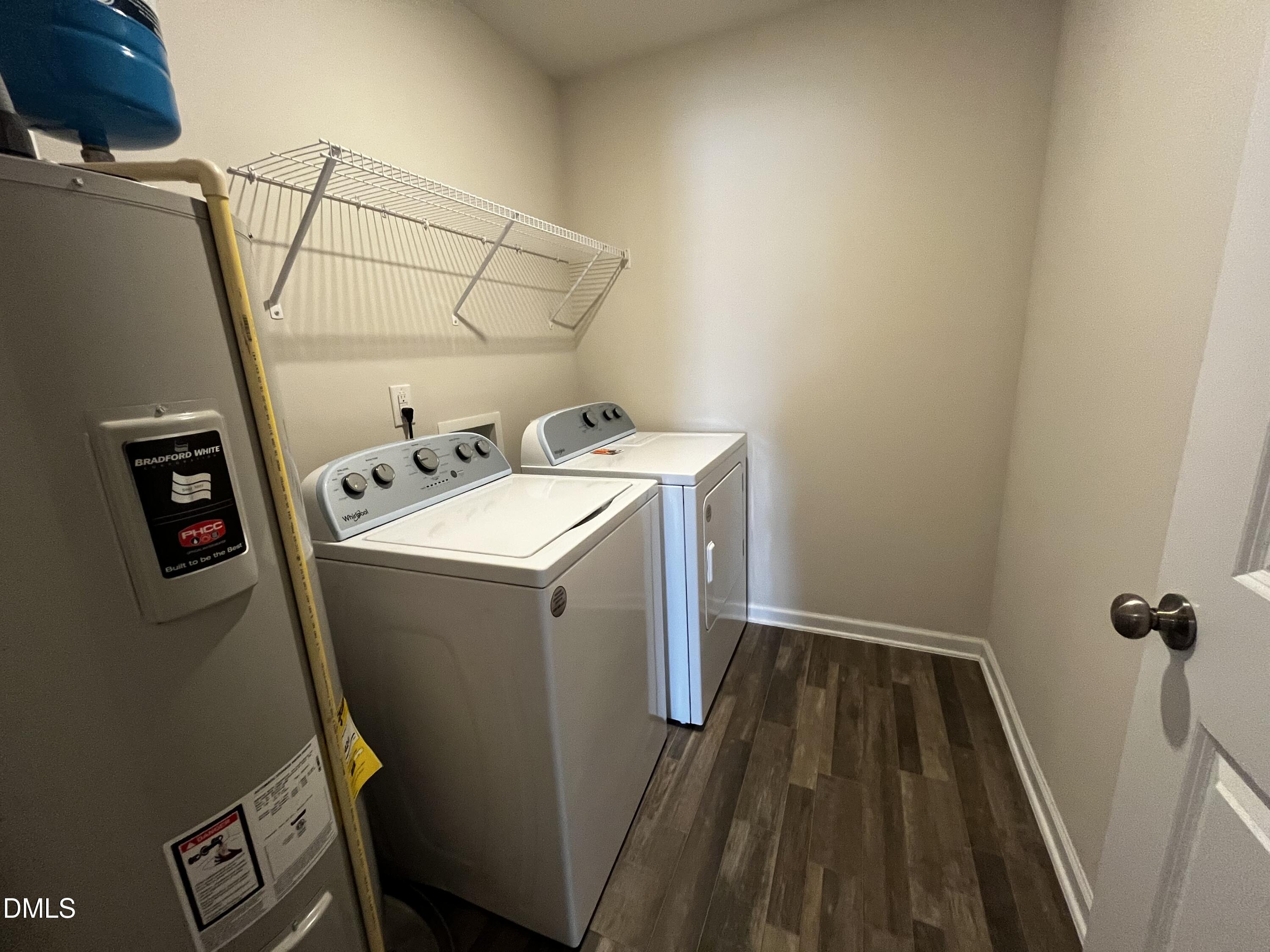 46 East Boulder Road Henderson, NC 27537 - Photo 11 of 15 a utility room with dryer and washer