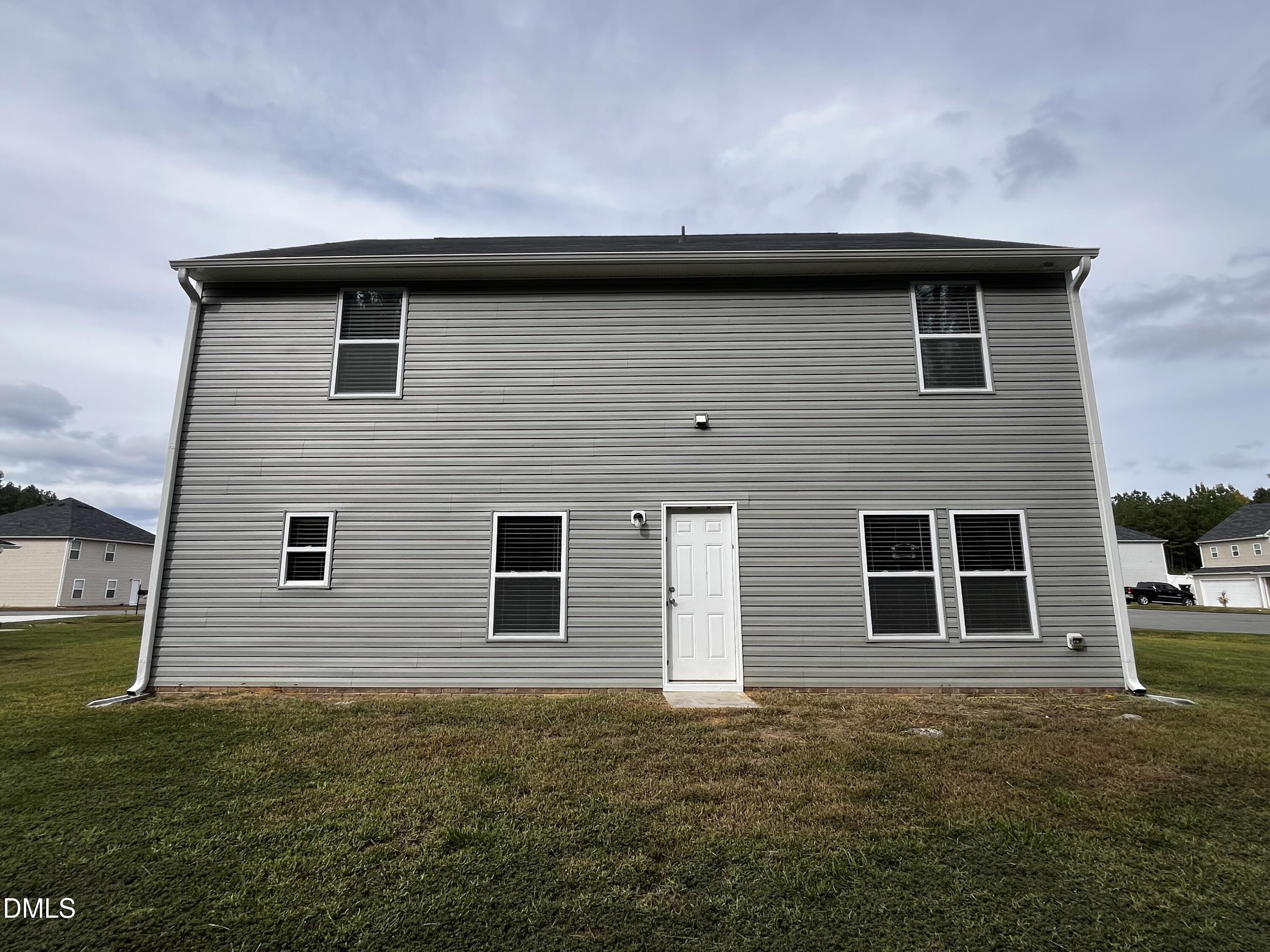 46 East Boulder Road Henderson, NC 27537 - Photo 15 of 15 a house that has a window in it
