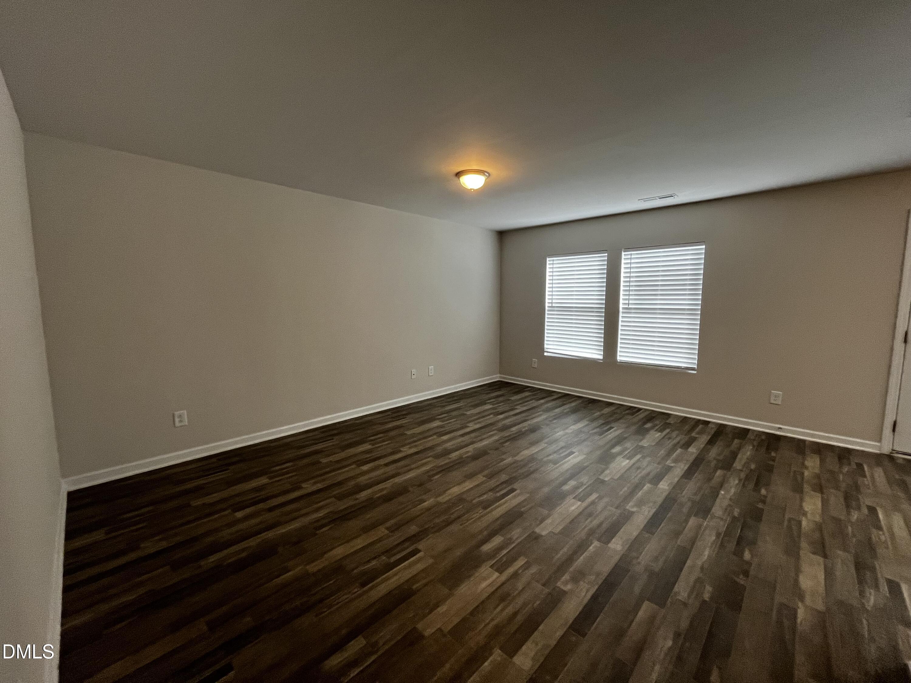 46 East Boulder Road Henderson, NC 27537 - Photo 3 of 15 a view of an empty room and window