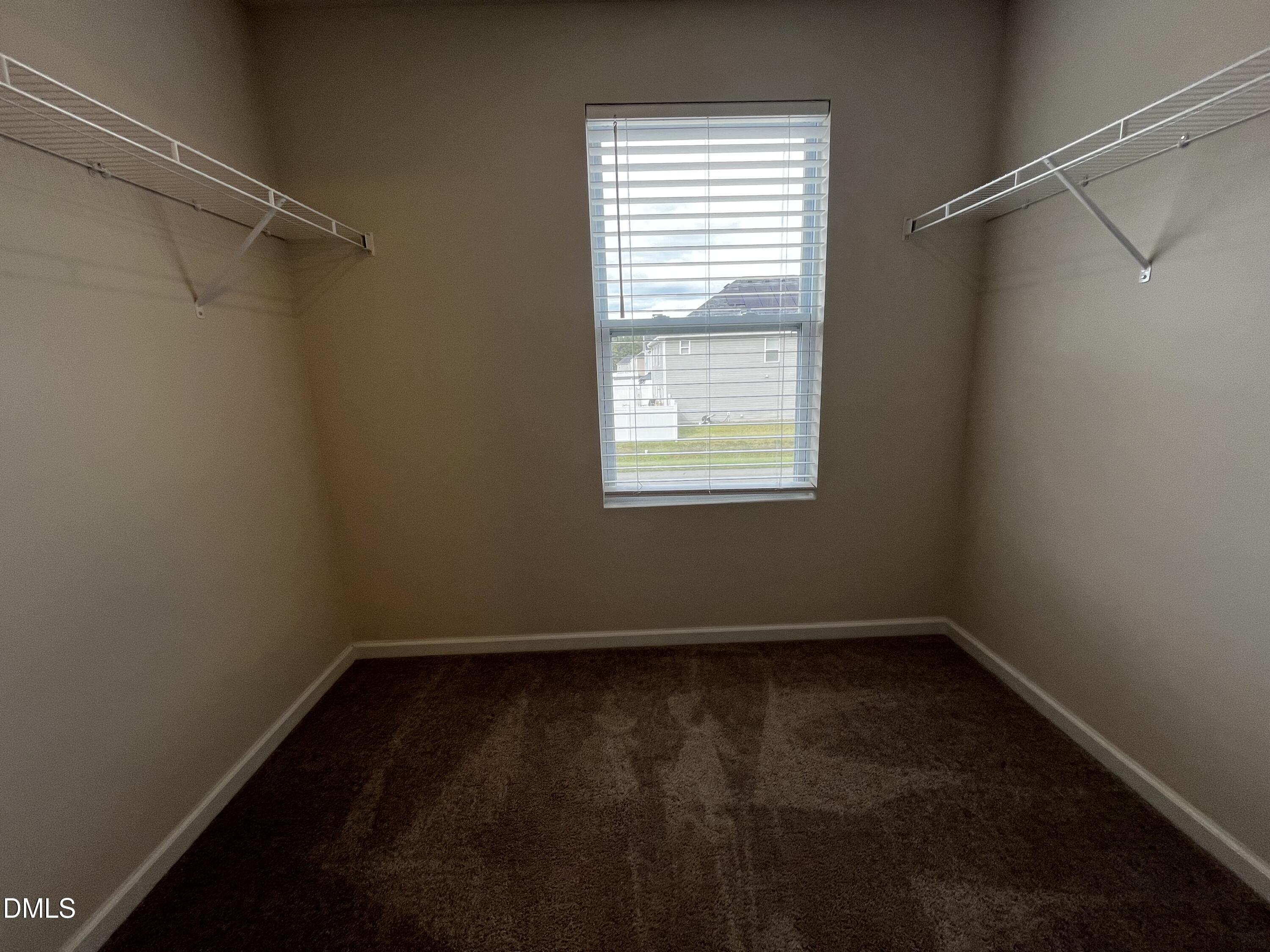 46 East Boulder Road Henderson, NC 27537 - Photo 10 of 15 a view of a room with window and a fan