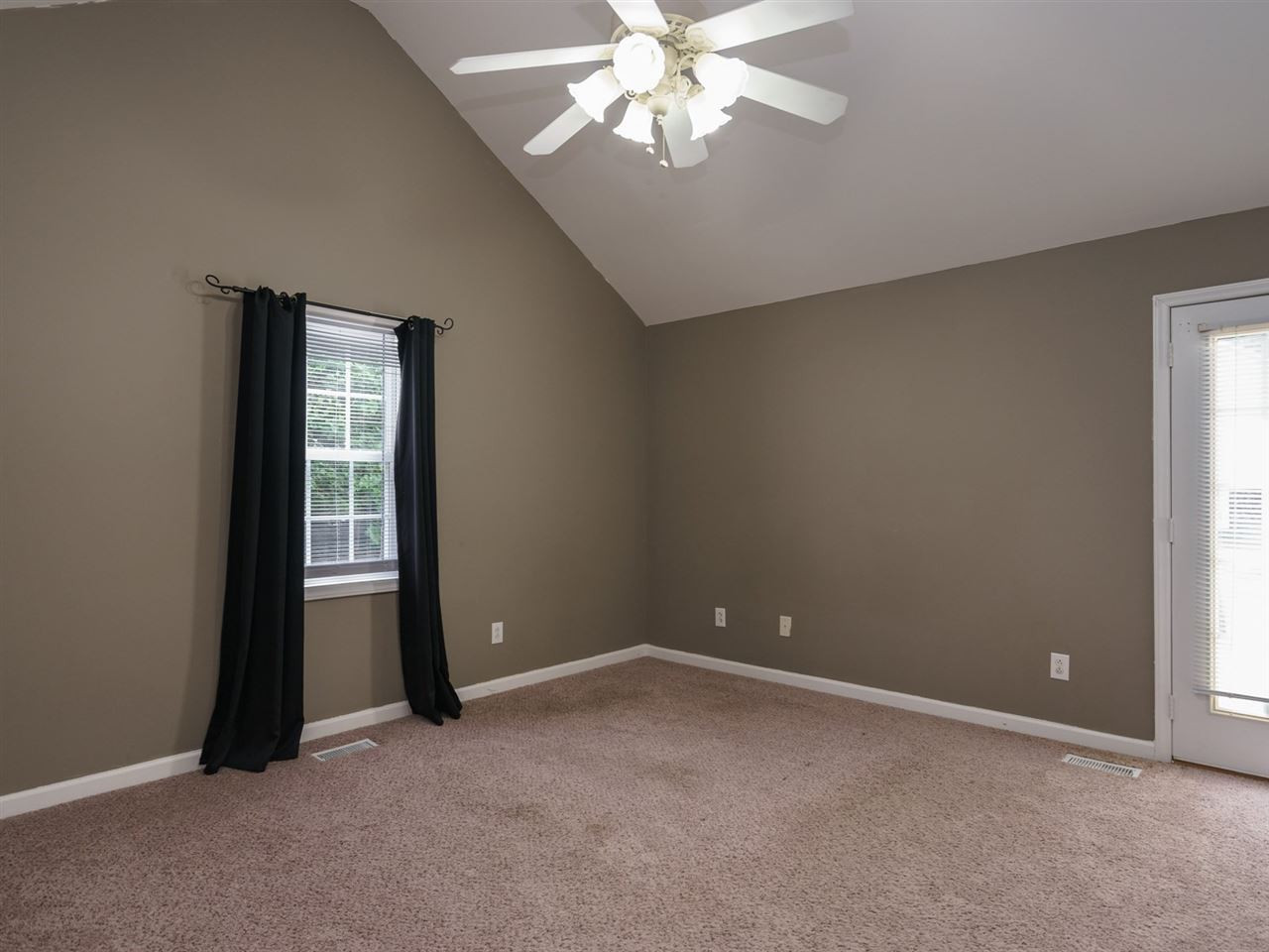 5692 Zacks Mill Road Angier, NC 27501 - Photo 14 of 25 There is also access to the deck from the master suite. Master Suite