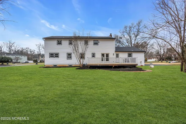 a front view of house with garden