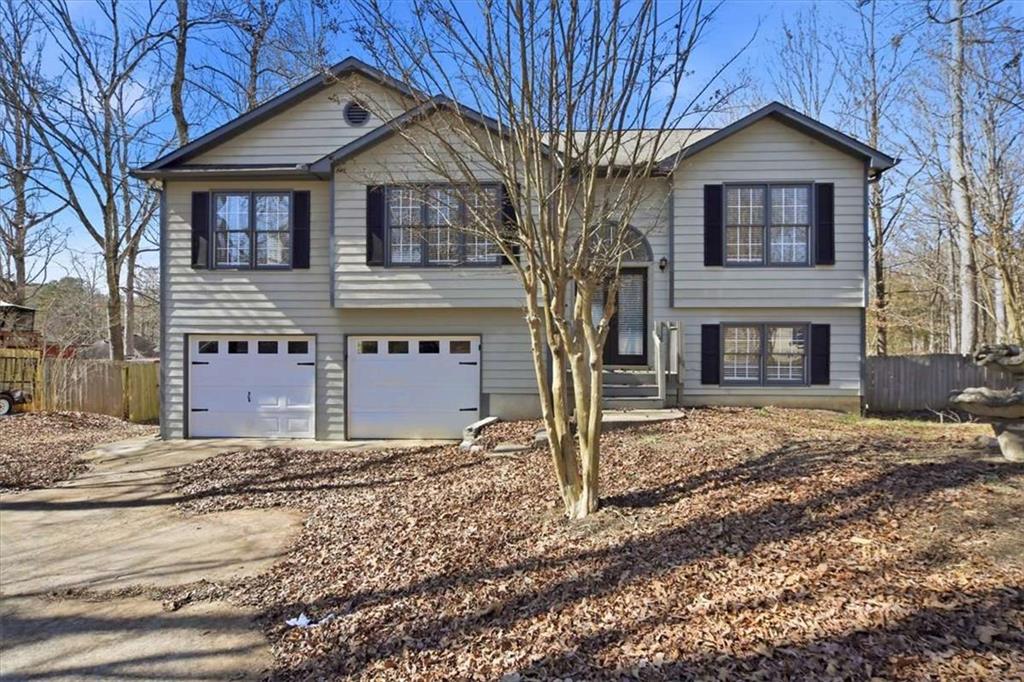 47 Stevenson Trail Dallas, GA 30132 - Photo 1 of 1 a front view of a house with a yard