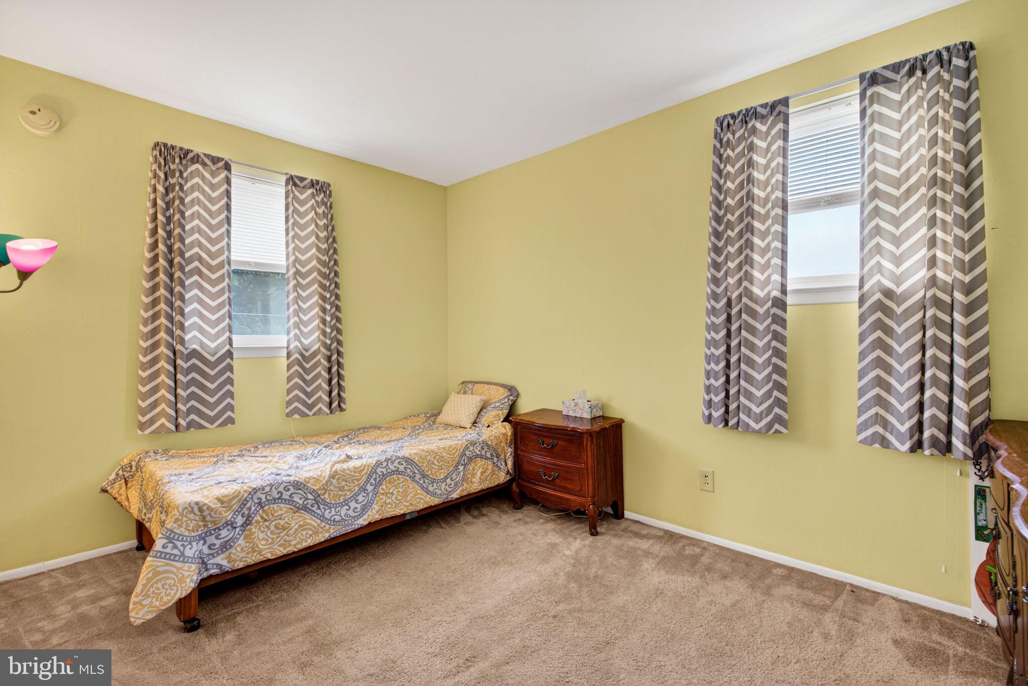 46 Trinity Avenue Marlton, NJ 08053 - Photo 14 of 37 a bedroom with a bed and a window