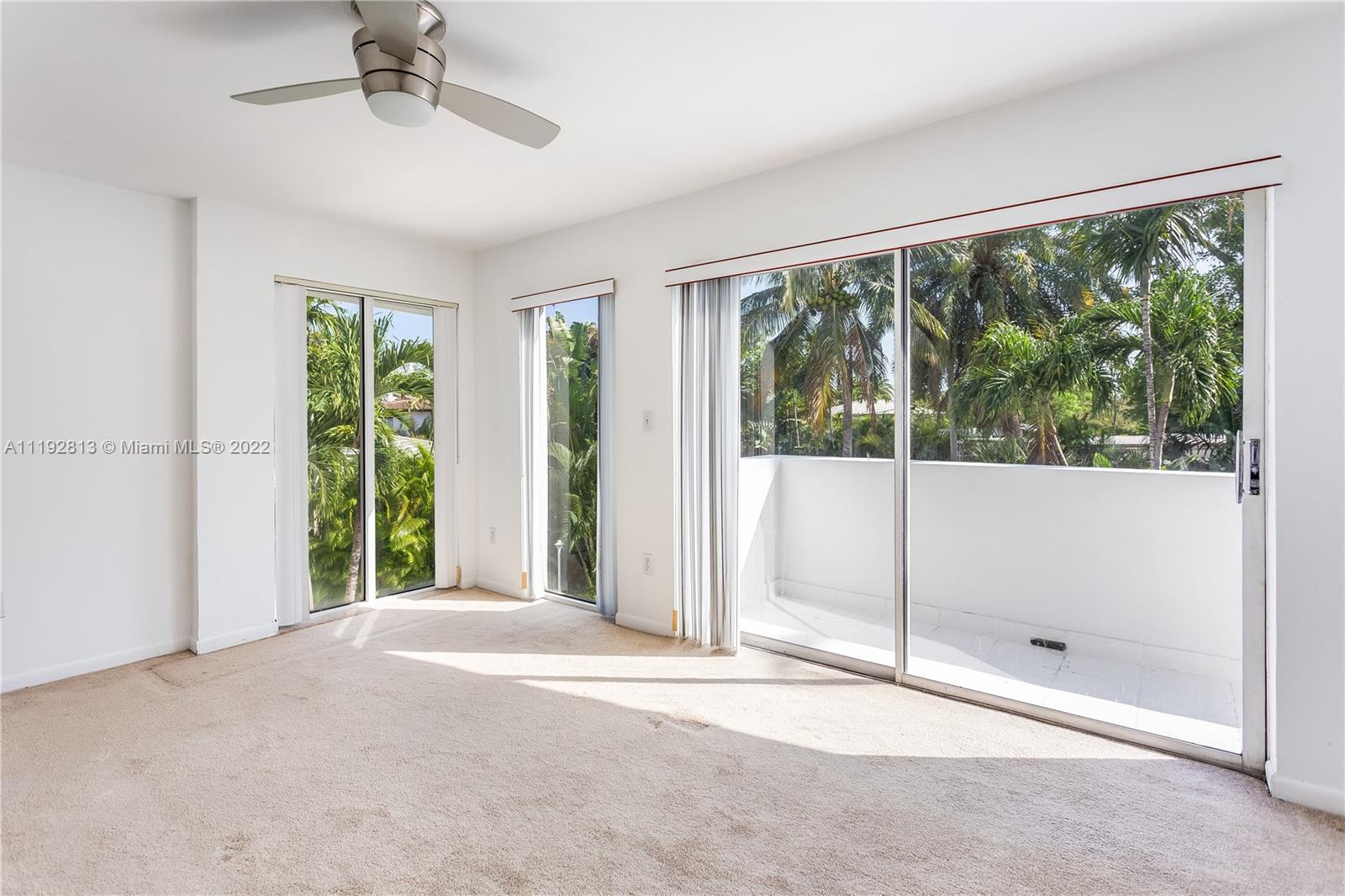 6180 Pine Tree Drive Miami Beach, FL 33140 - Photo 31 of 32 a view of a room with a large window