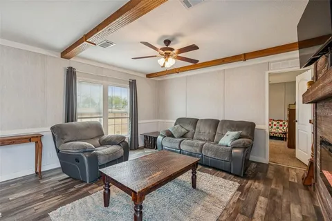 a kitchen with granite countertop a sink appliances and cabinets