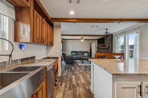a view of a livingroom from a hallway