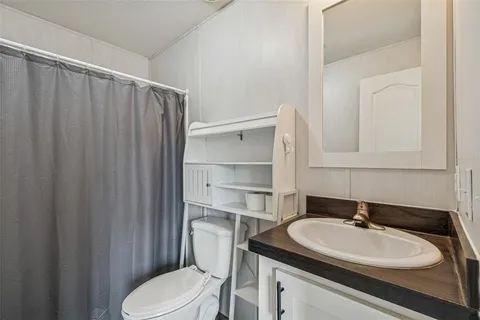 a view of front door and potted plants
