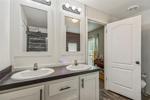 an aerial view of residential building with ocean view