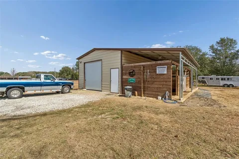 a view of a room with wooden walls