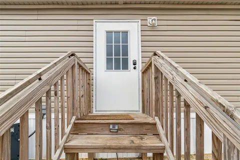 a view of a house with wooden door