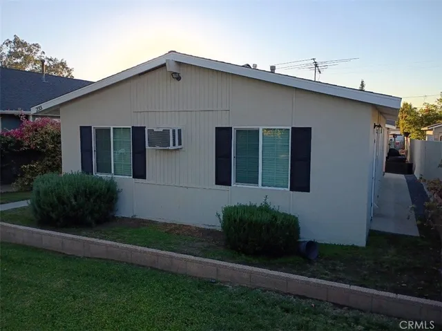 a house that has a lot of plants in it