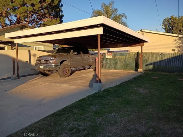 a view of parking garage with a car parked