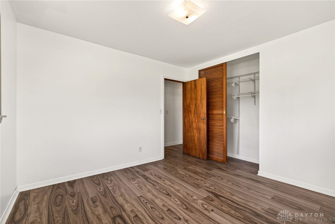 1005 Free Road New Carlisle, OH 45344 - Photo 28 of 43 This bright room features durable flooring, offering a fresh canvas for your personal touches.
