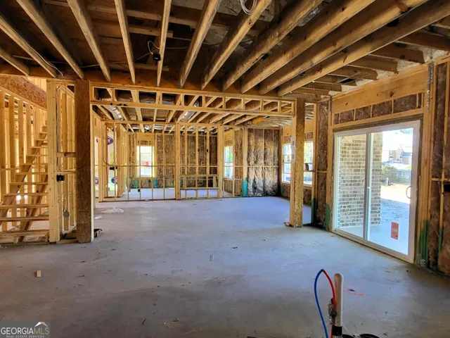 a view of a room with wooden walls